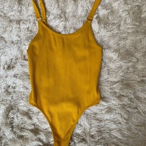 Fashion Nova mustard yellow bodysuit